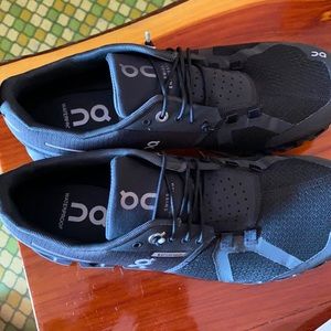 Waterproof OnCloud running shoes. Never worn.